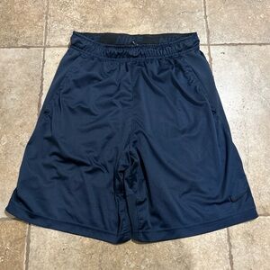 Blue Nike athletic shorts